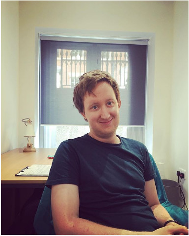 The image is a photograph of the therapist Dave Hansen, who offers online person-centred therapy and online EMDR therapy